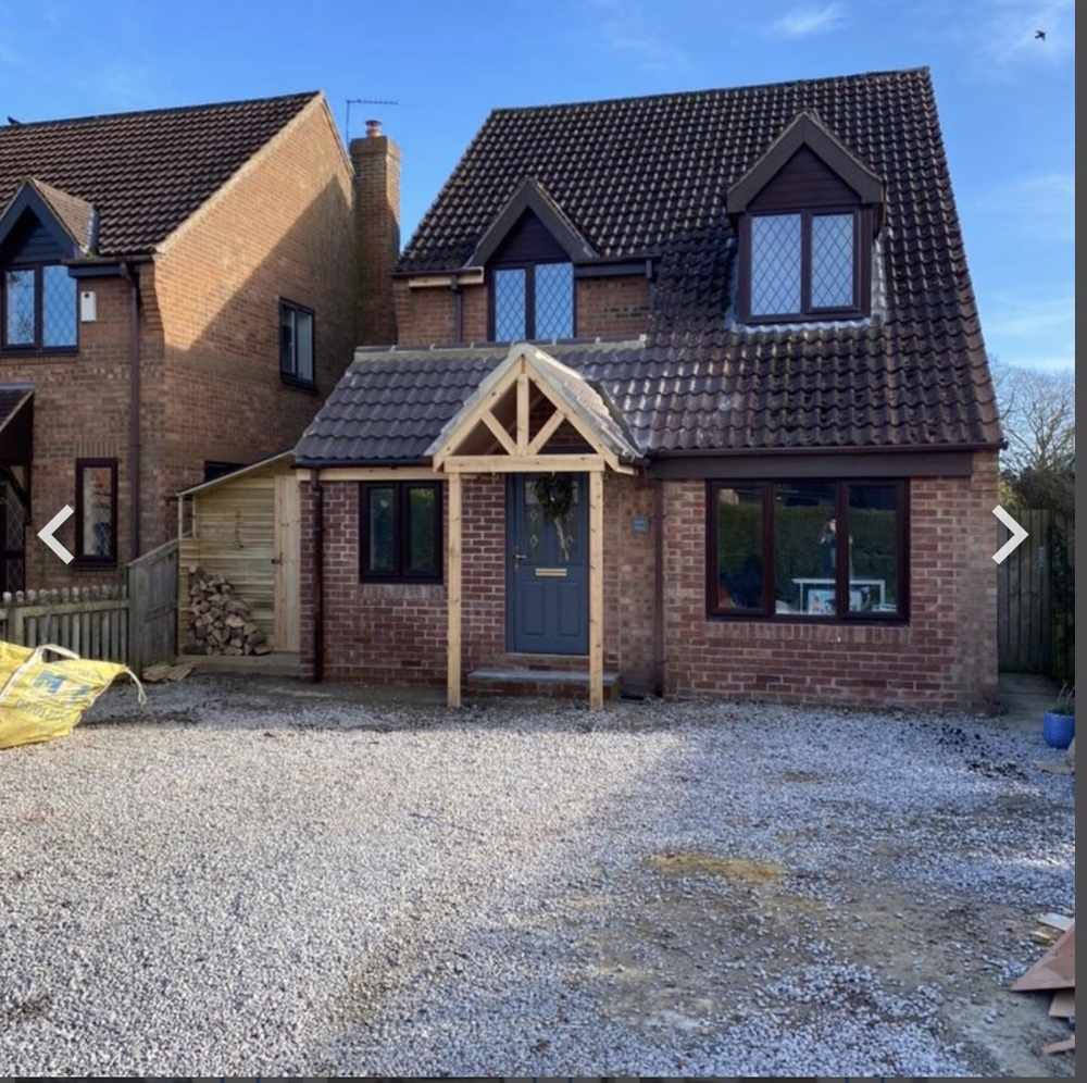 Oak framed front porch with a tiled roof in Pocklington by RW Builders